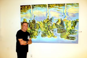 Village artist Jorge Ballará’s painting reflects local flora