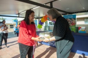 Mayor Daniella Levine Cava distributes baby formula to families at the Centro Mater East Head Start Center.