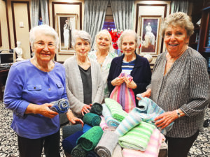 The Palace residents knit to help others