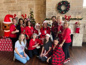 Santa and his elves bring holiday cheer to local kids