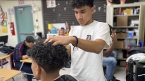 Barbering Class instructor teaches students important skills for succeeding in life, work