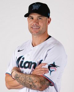 Miami Marlins manager Skip Schumaker looks on during a baseball