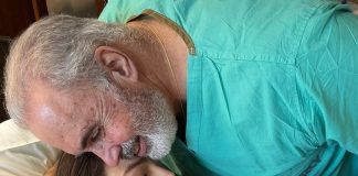 Doctor delivers baby of the first baby he delivered at Mercy Hospital Doctor delivers baby of the first baby he delivered at Mercy Hospital