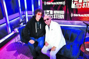 Howard Stern welcomes Pitbull to launch SiriusXM’s local studios