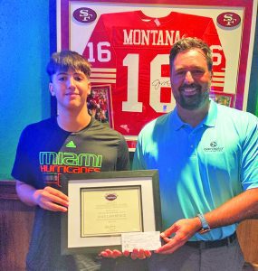 Miami Touchdown Club honors scholar athlete Max Lawrence