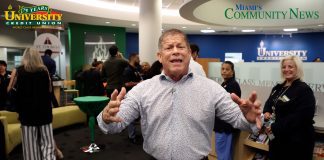 Grant Miller joins the celebration naming the Michael Welch Sr. building at University Credit Union