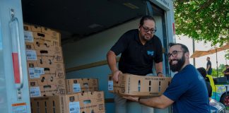 Dade County Federal Credit Union and Dimelo305 Flock Together for Local Families at Annual Turkey Give-Away