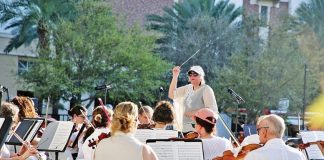 Orchestra Miami adds free concert series to repertoire Maestro Elaine Rinaldi leads Orchestra Miami during a recent performance.