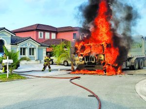 Miami-Dade Fire Rescue units respond to garbage truck fire