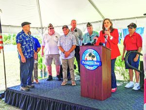 U.S. Rep. presents check for village’s Veterans Park