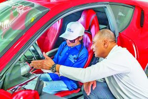 Blind, visually impaired students get up-close experience with exotic cars