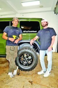 Father and son team works to keep cars clean and cool