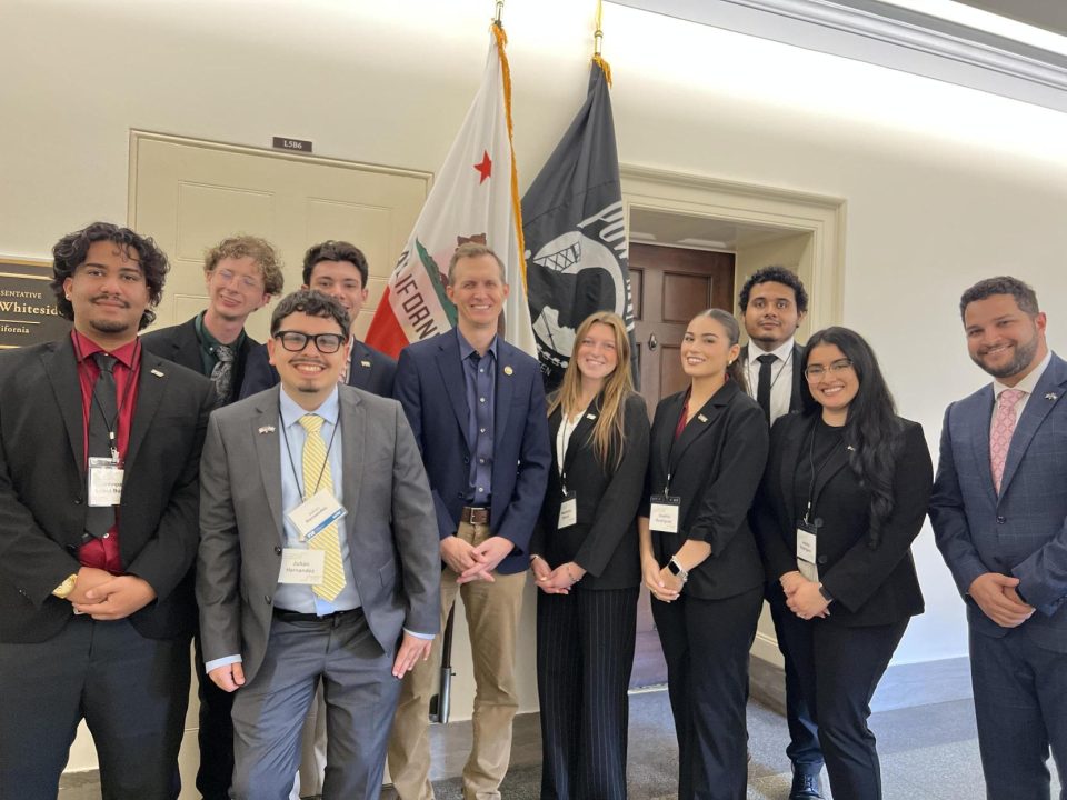 Ashley Corina Rodriguez (second from right) along with FIU students and a staff member with Congressman George Whitesides (center).