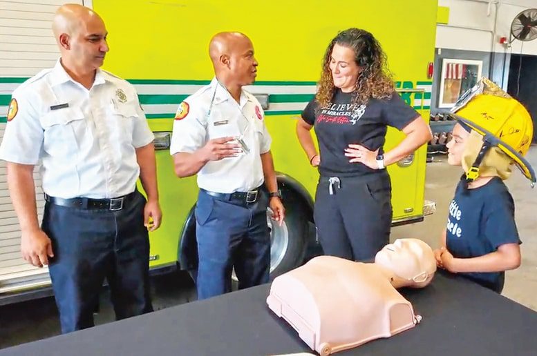 Young patient reunites with MDFR firefighters