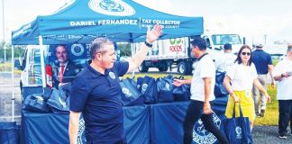 Tax Collector Fernandez provides turkeys at new Coral Reef Office Miami-Dade County Tax Collector Dariel Fernandez distributes turkeys to families at new Coral Reef Office.