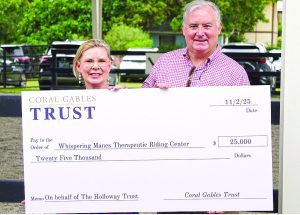 Coral Gables Trust presents $25K to Whispering Manes