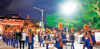 Junior Orange Bowl Parade marches along Miracle Mile Junior Orange Bowl Parade marches along Miracle Mile