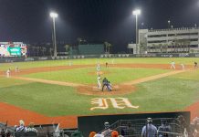 A five-run 8th inning by the Gators breaks a 2-2 tie, giving them a 7-2 win in game one