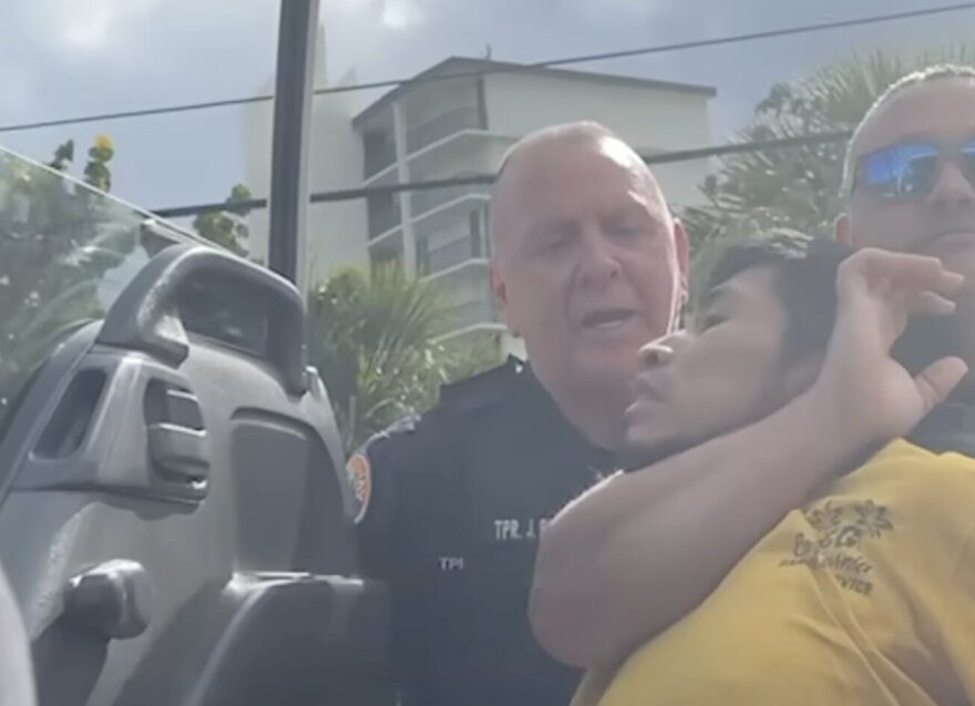 Florida Highway Patrol Trooper John Petrofsky (center, background) participated in the high-profile arrest of Kenny Laynez-Ambrosio, an 18-year-old American man.