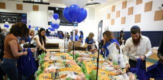 Volunteers participate in JCS Matzah Mitzvah event Volunteers participate in JCS Matzah Mitzvah event